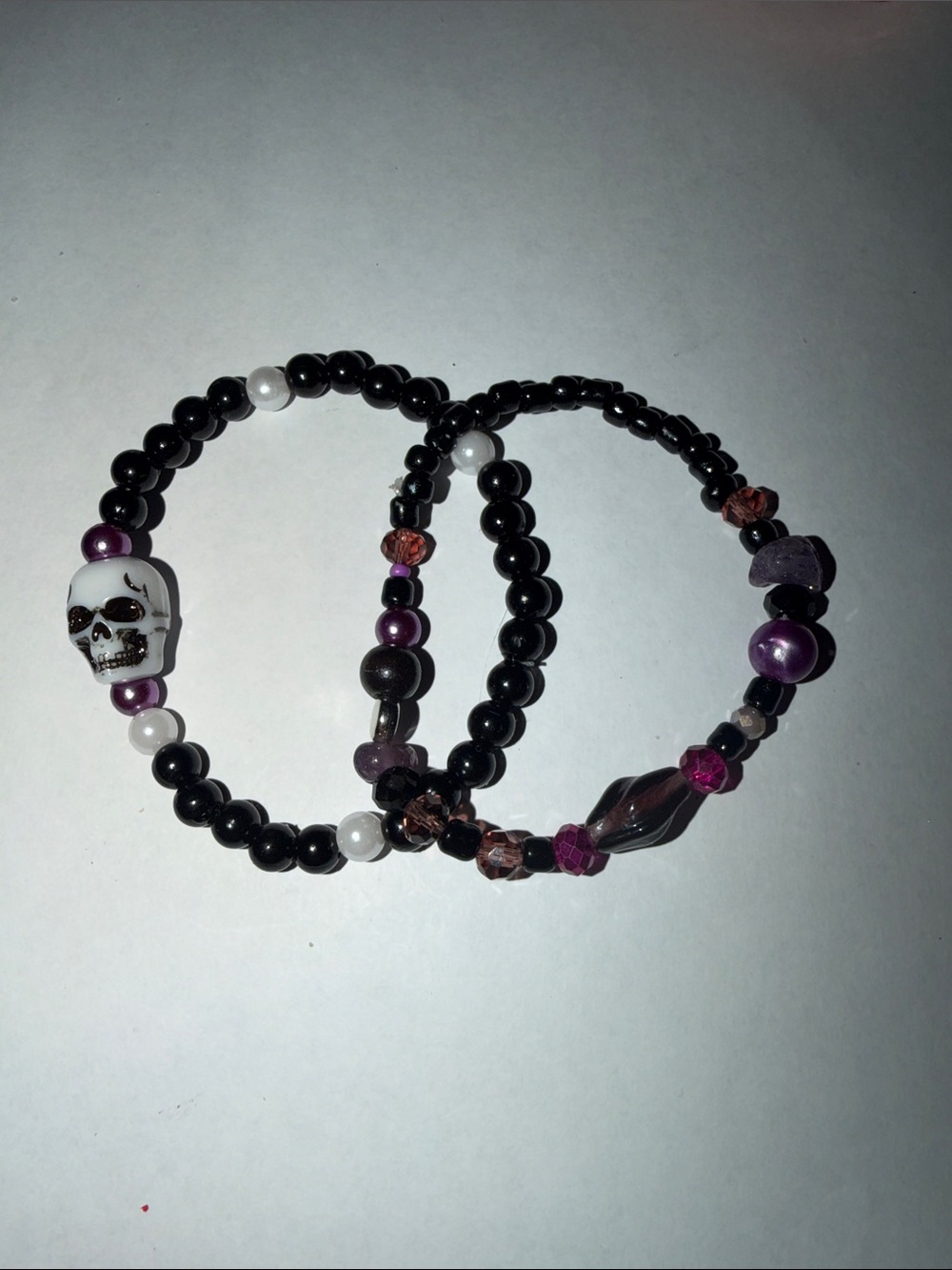 Edgy Black and Purple Beaded Skull Stretch Bracelet Set